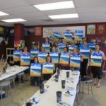 Dallas singles club members at a painting class
